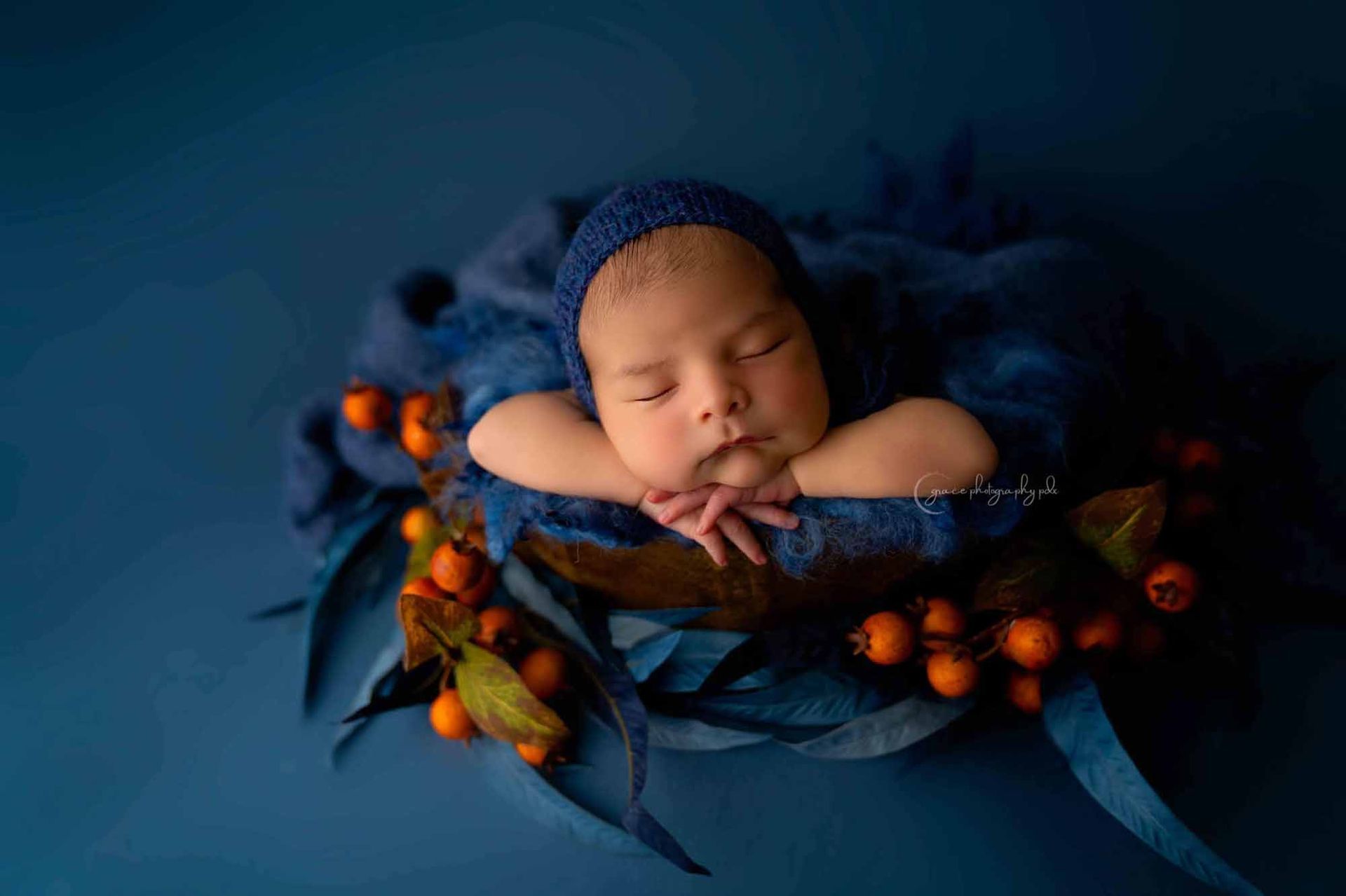 Infant on blue background