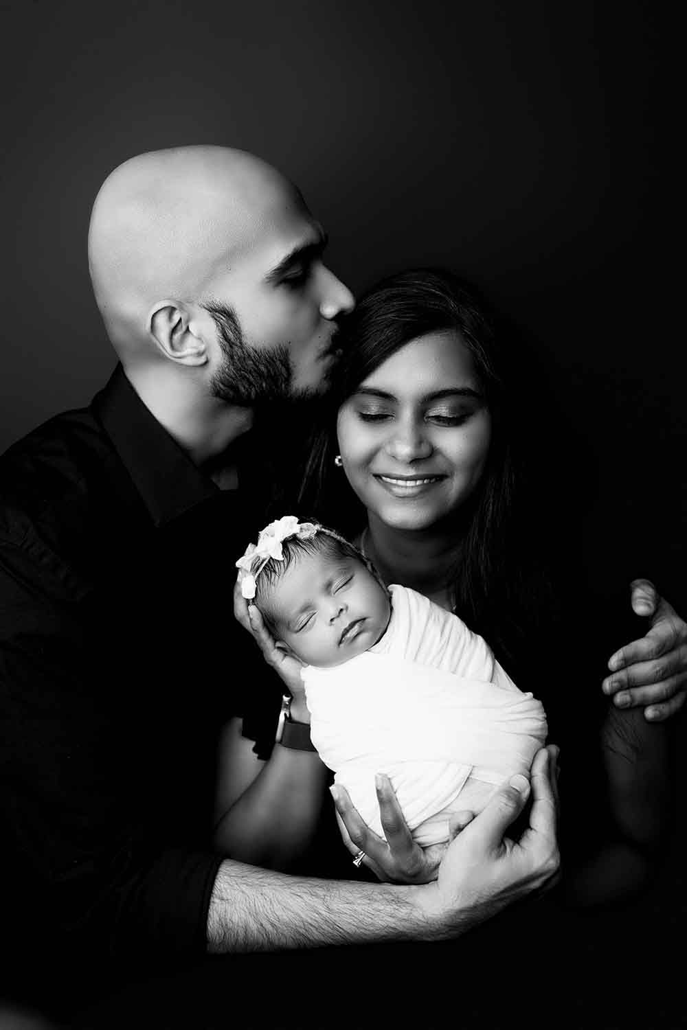 Couple with their newborn