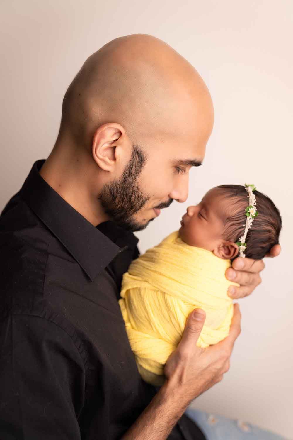 Man holding a baby