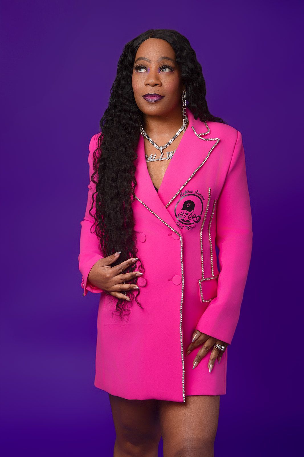 A woman in a pink blazer dress