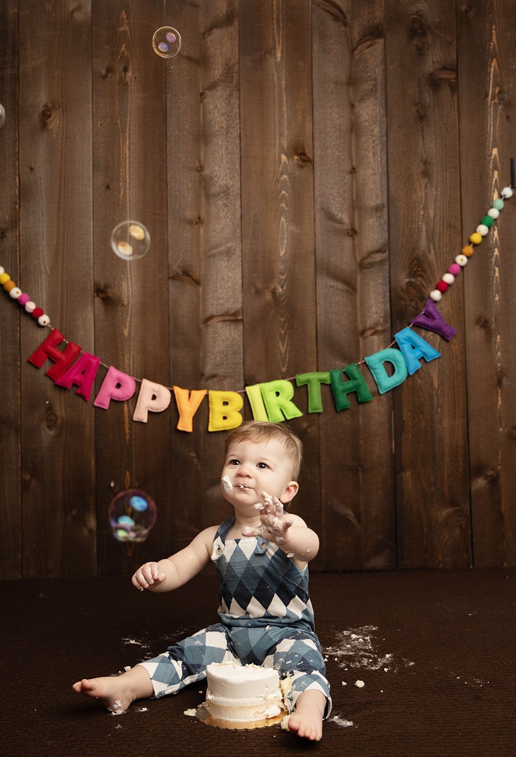 Baby smashing a cake