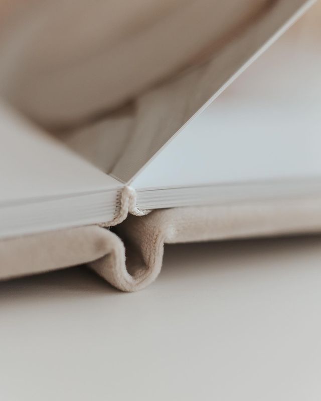 A close up of an open book on a table