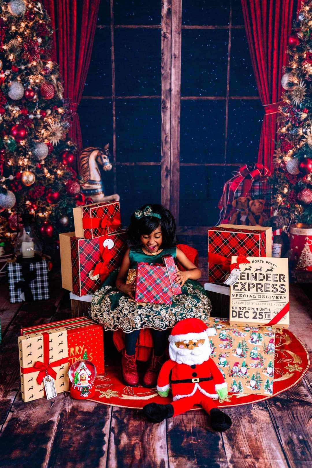 Girl opening a Christmas present