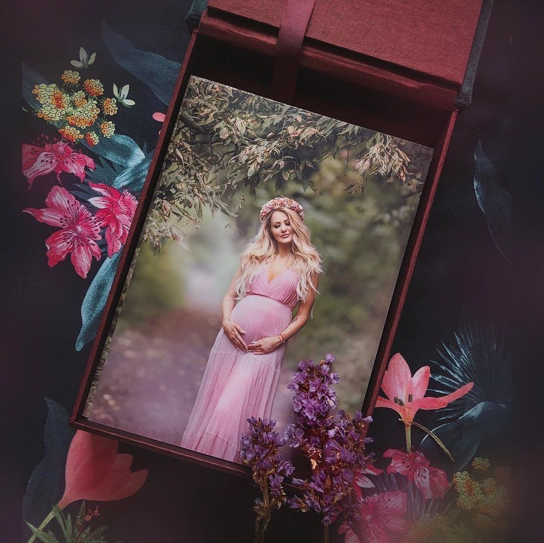 Package box with a photo of a pregnant woman in a pink dress