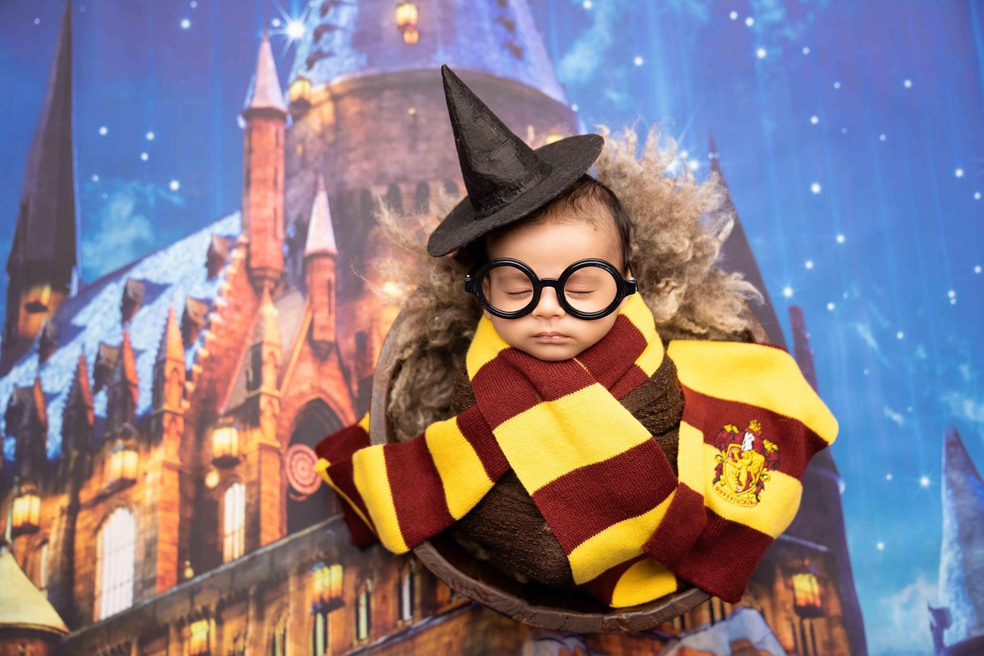 A baby dressed as Harry Potter
