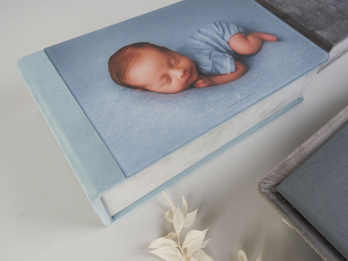 A book with a picture of a baby sleeping