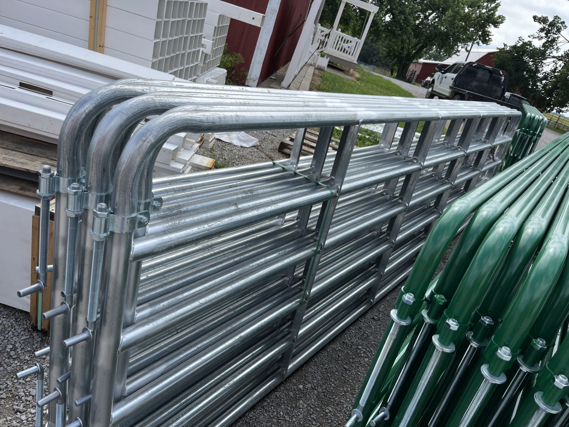 A bunch of metal pipes are stacked on top of each other.
