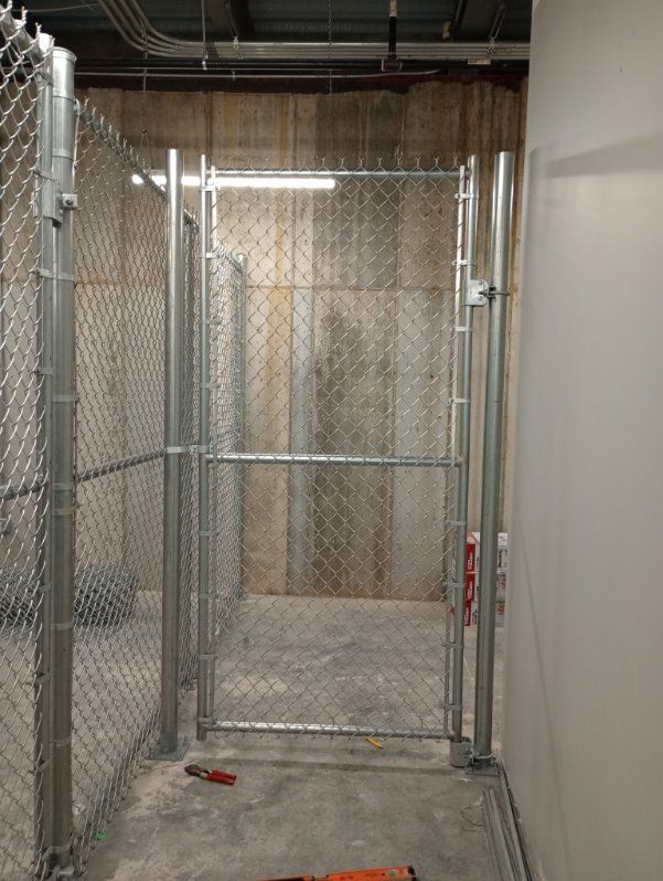 A chain link fence with a gate