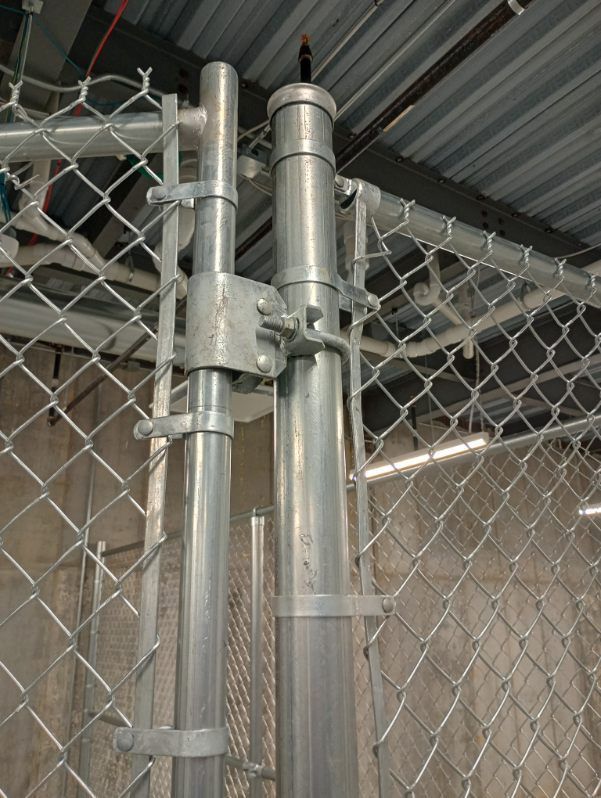 A close up of a chain link fence