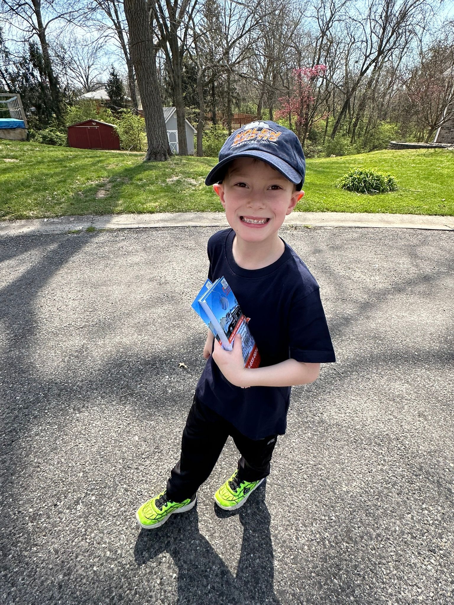 A young boy wearing a hat 