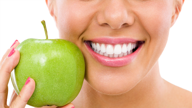 White teeth with apple