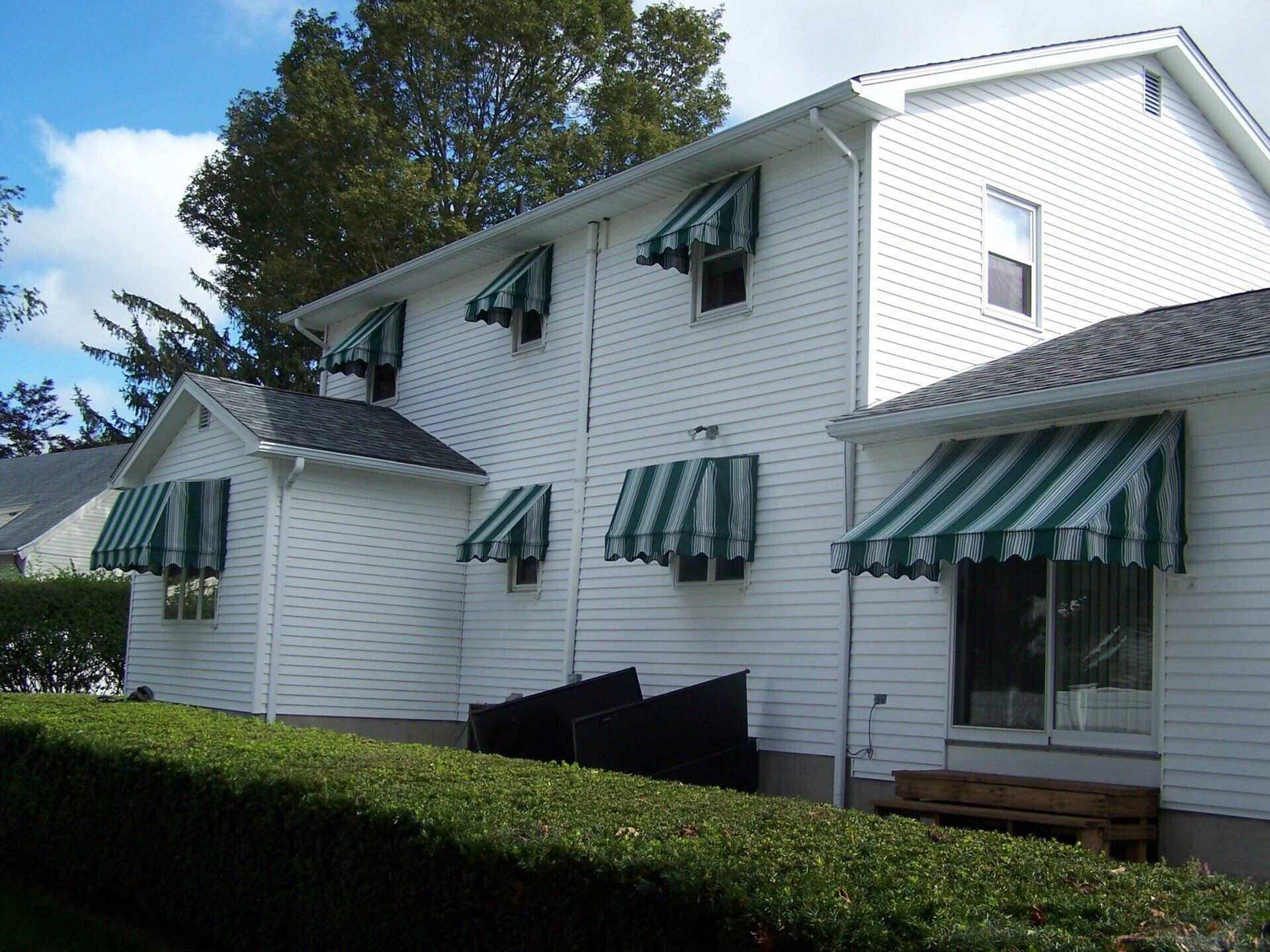 Green and white stripes awning