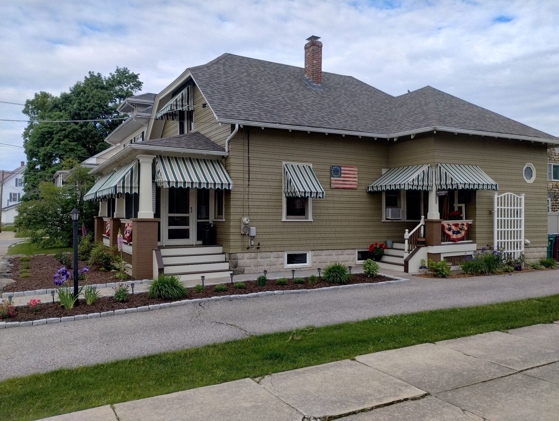 A house with a flag on the front of it