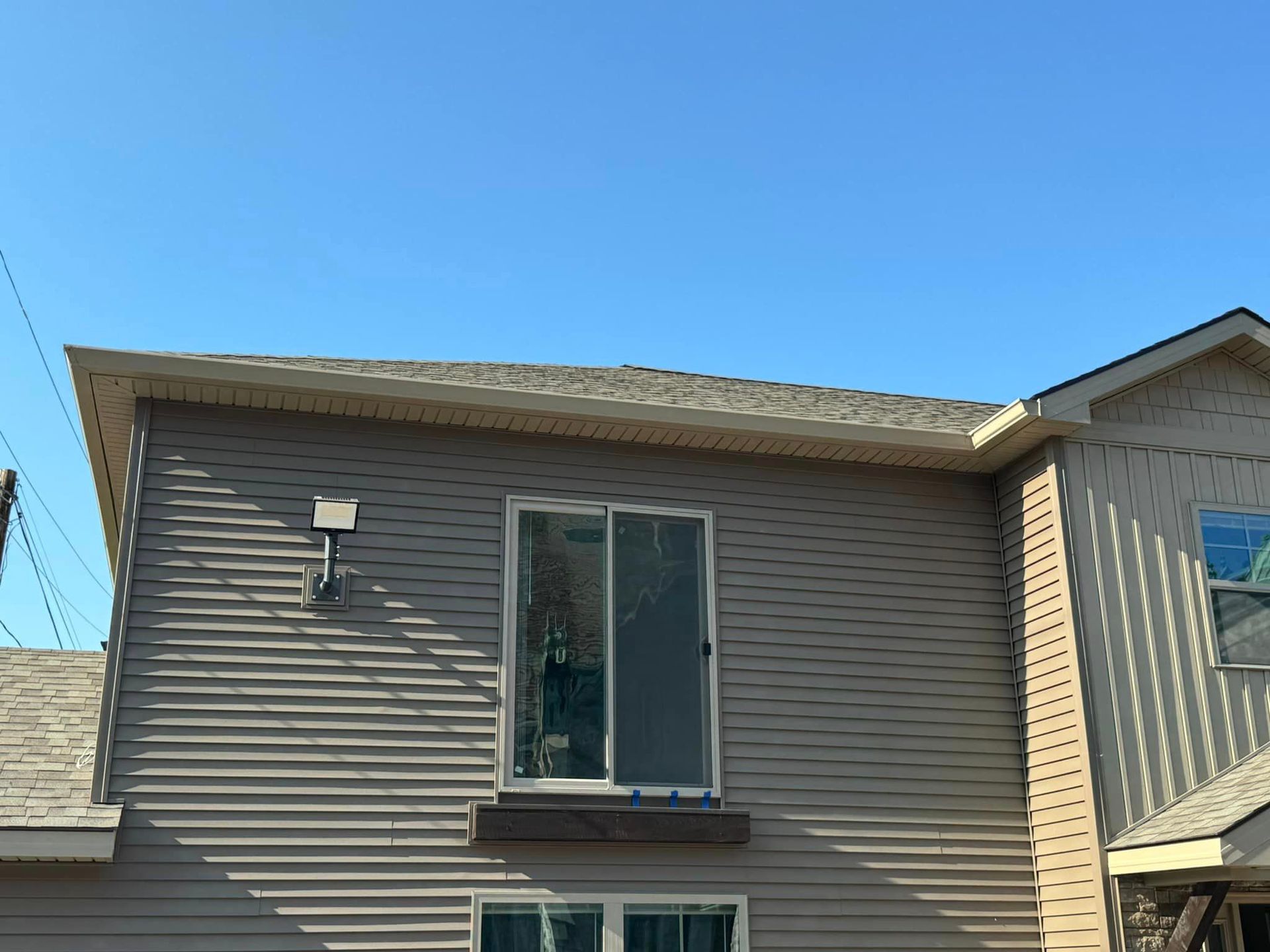 A building with sliding glass windows