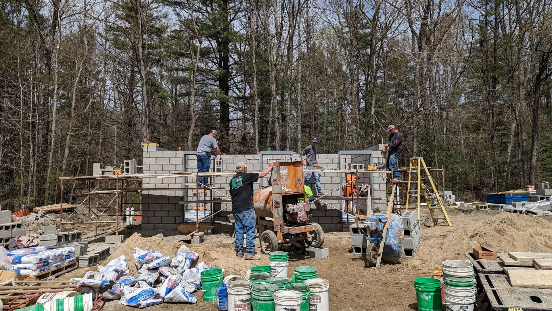 A group of people are working on a construction site.