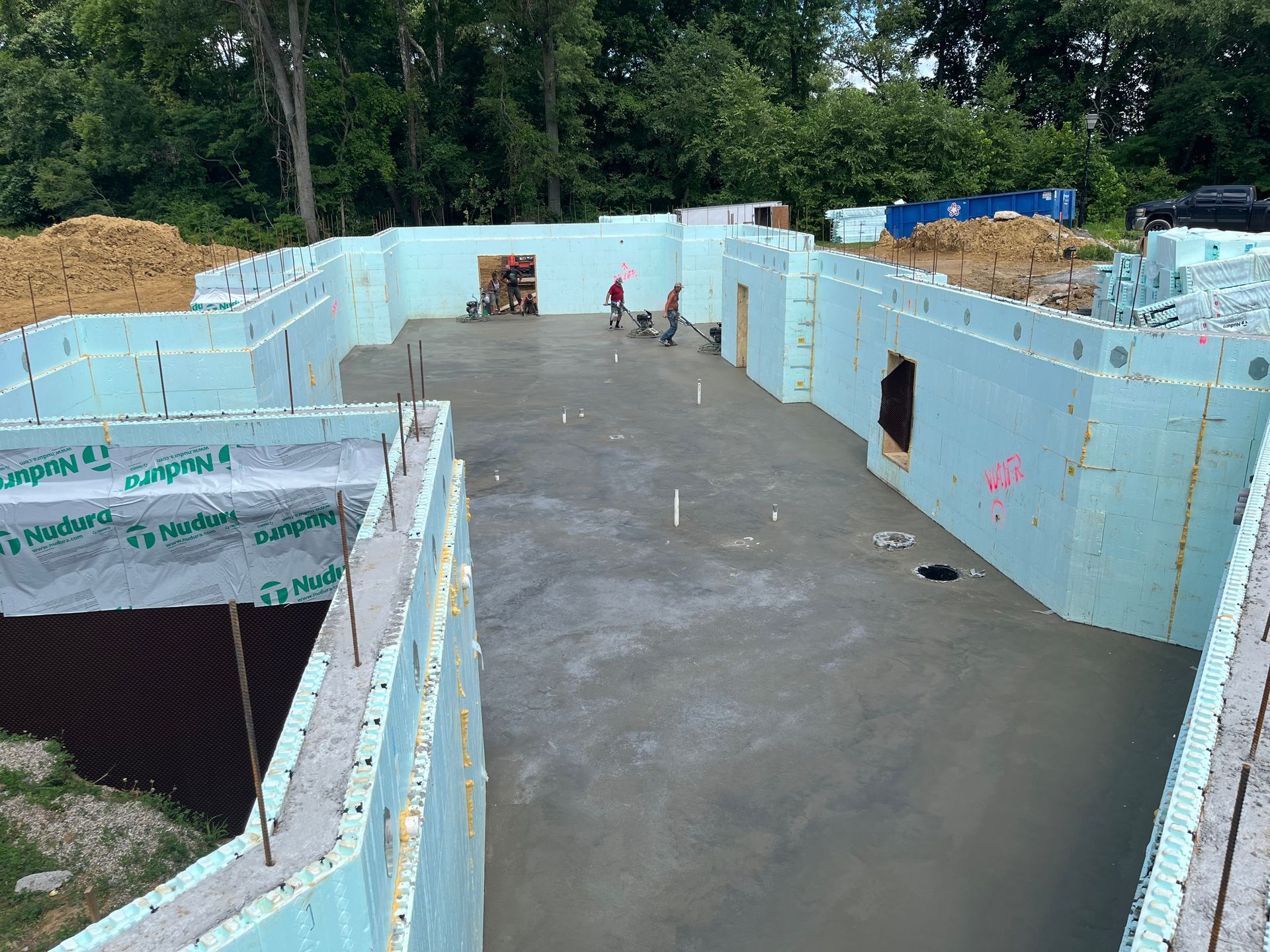 A large building under construction with a lot of foam blocks.