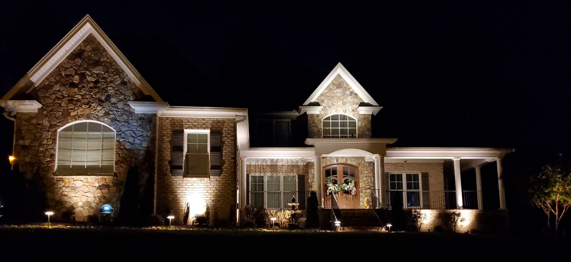 House with yard lights