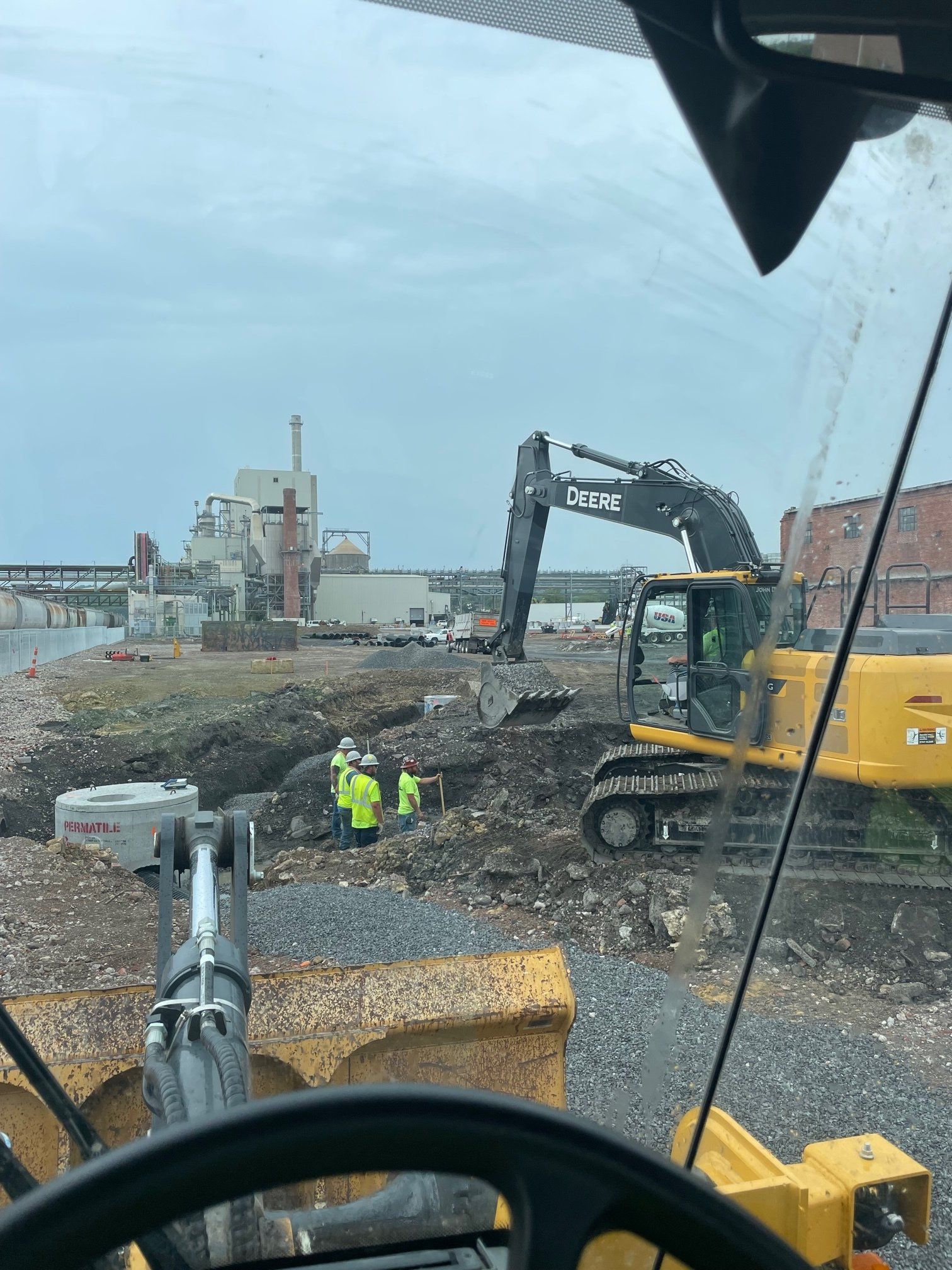 Bulldozer and excavator being use on the site
