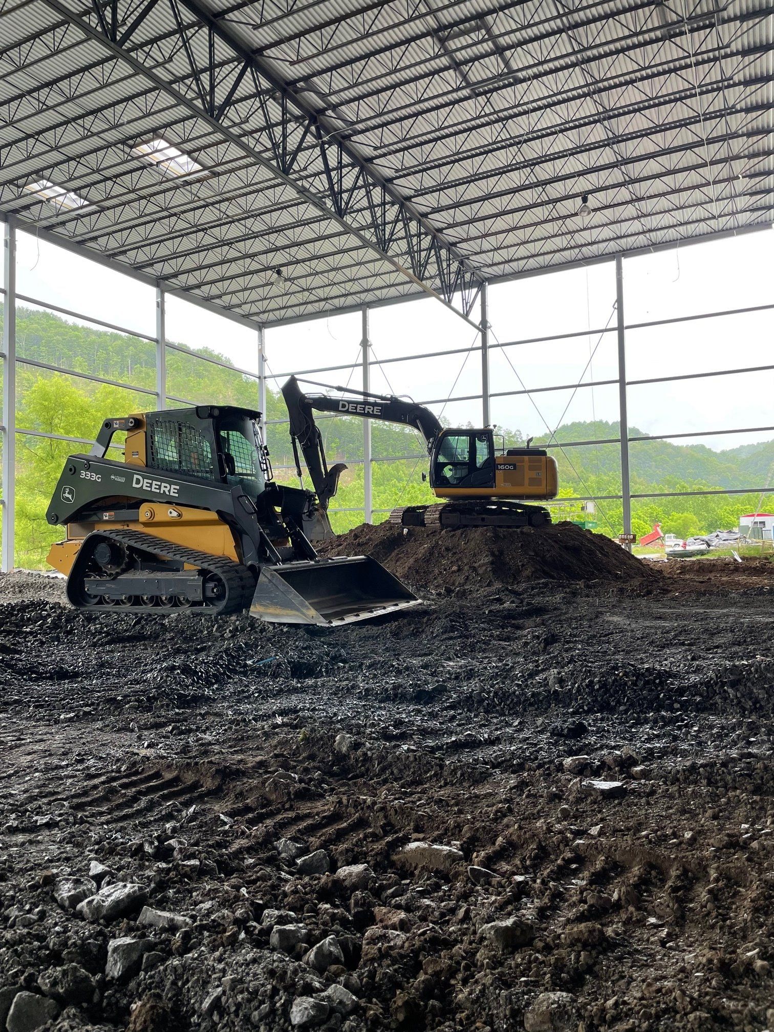 Bulldozer and excavator being use on the site