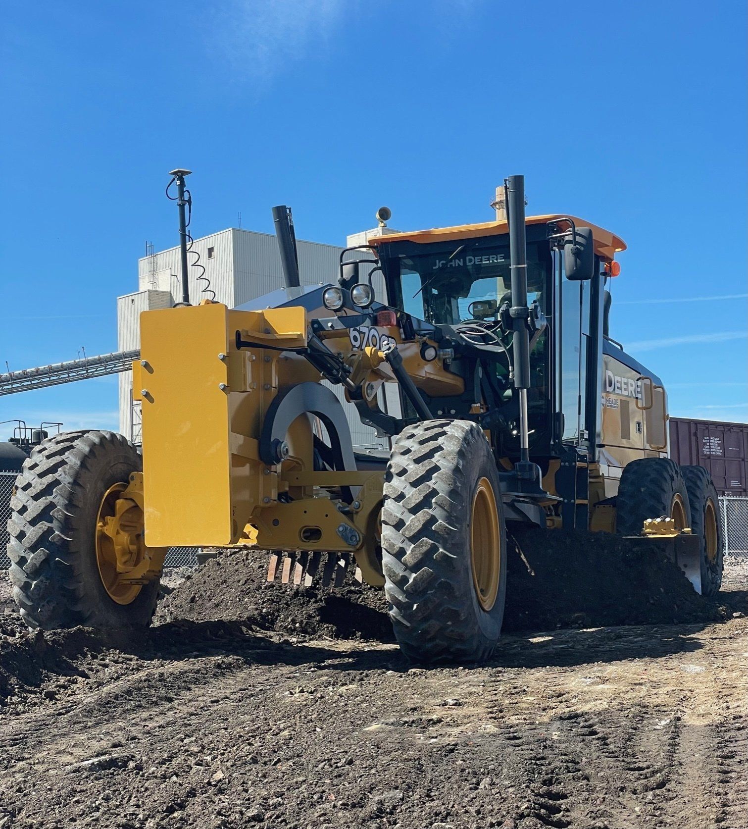 Motor grader being use on the site
