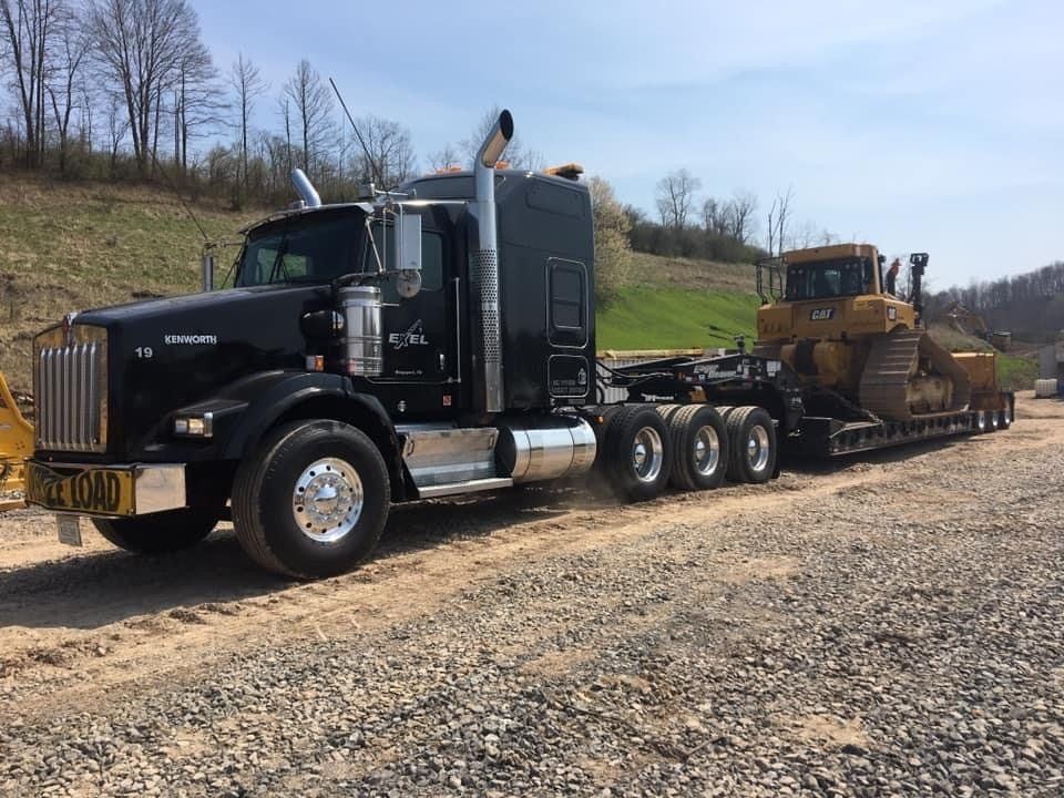 Big rig truck hauling a bulldozer