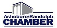 Asheboro/Randolph Chamber logo with stylized building icon in blue and gray