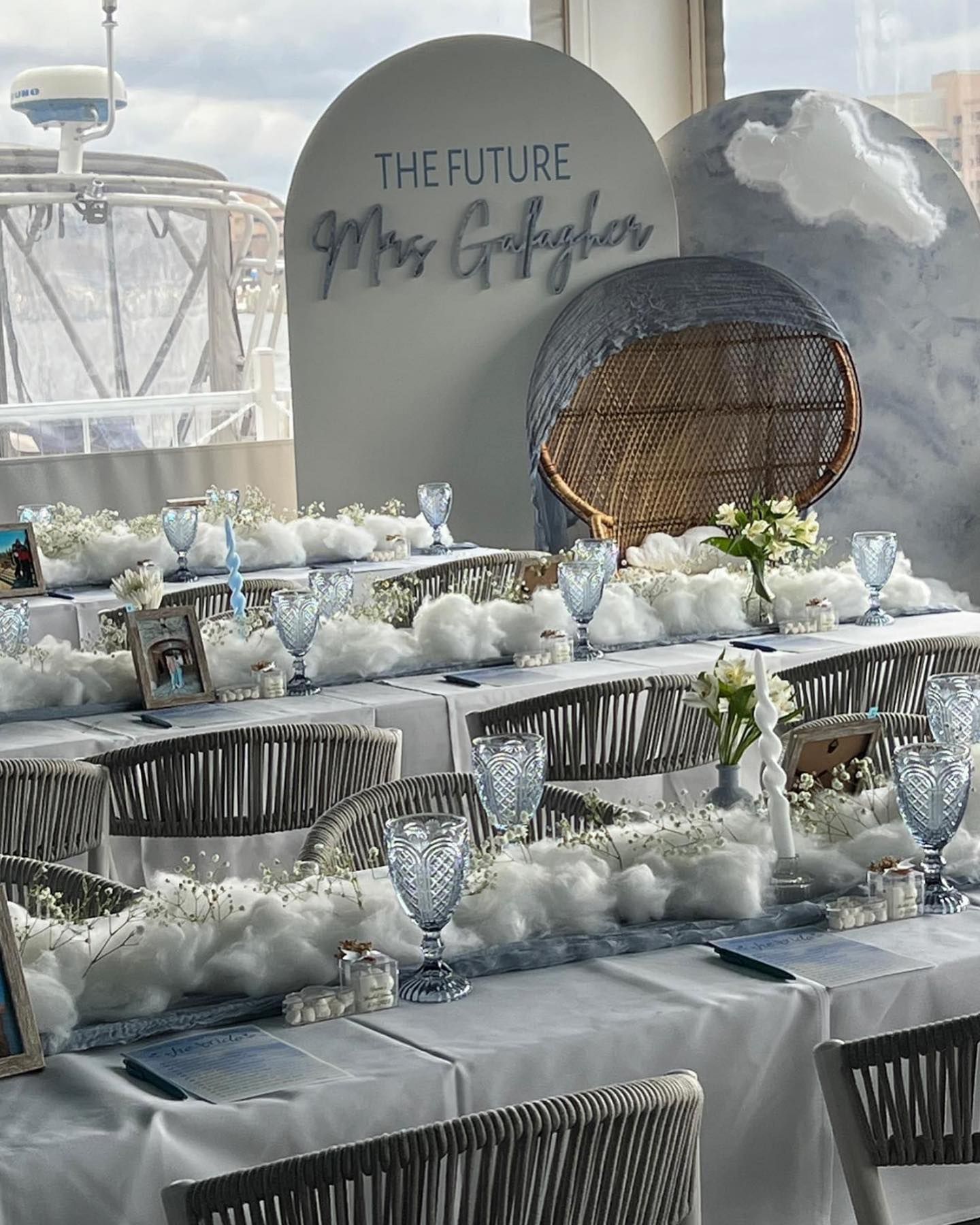 Elegant table setting with cloud decorations for a Future Mrs. Gallagher event.