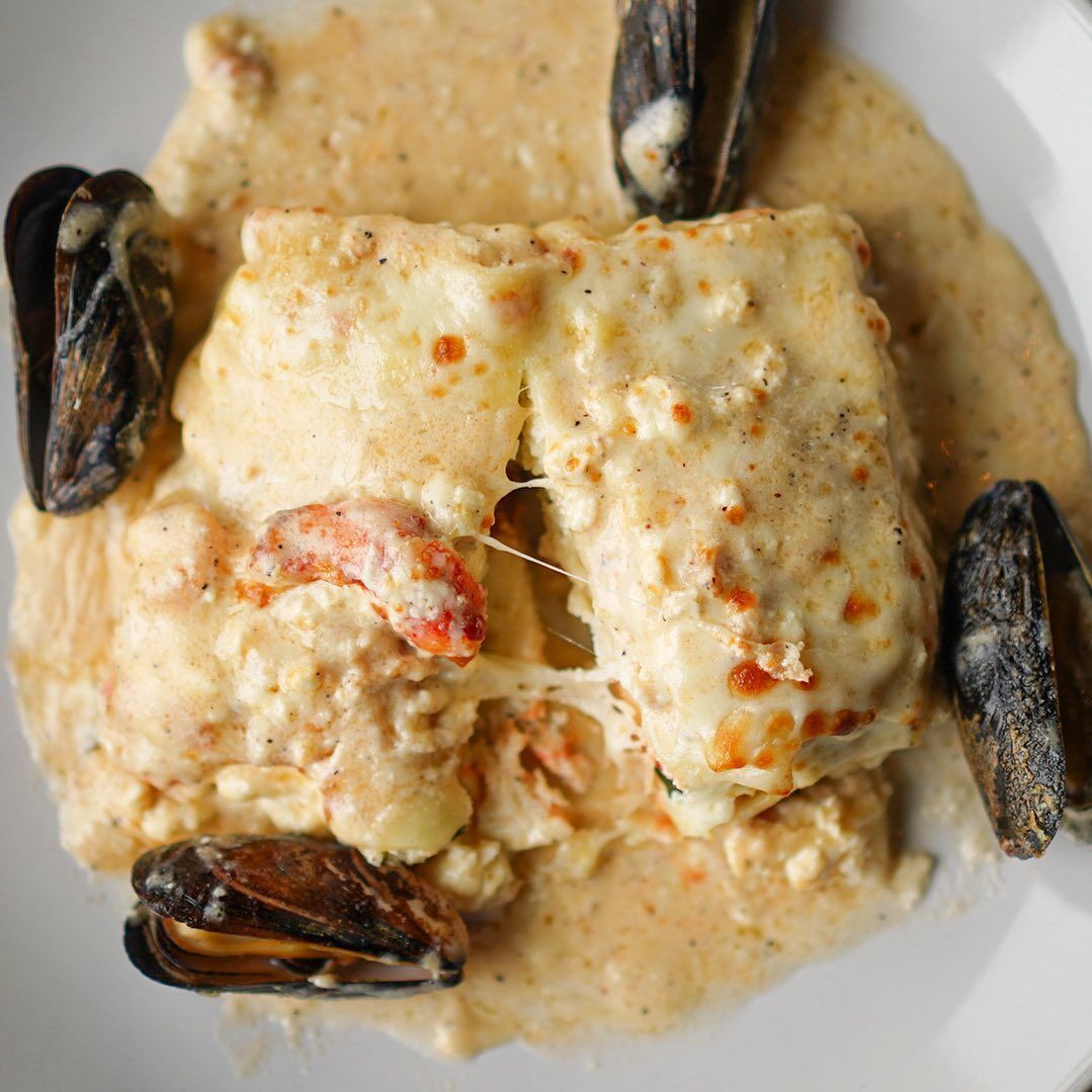 Cod dish in creamy sauce with mussels.