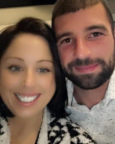 Couple smiling close-up.