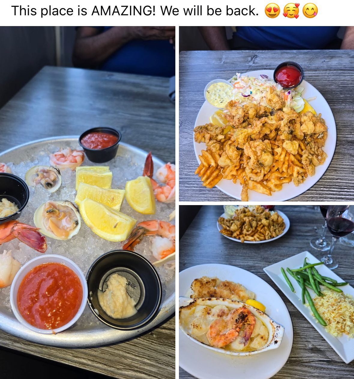 Seafood dishes on a table. Raw seafood platter, fried clams, baked fish, with side dishes and sauces.