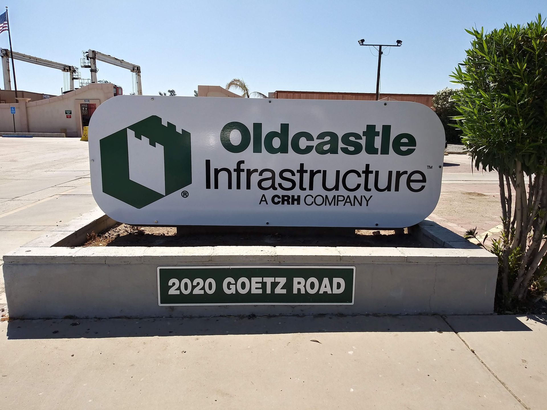 Oldcastle Infrastructure sign at 2020 Goetz Road on a sunny street corner