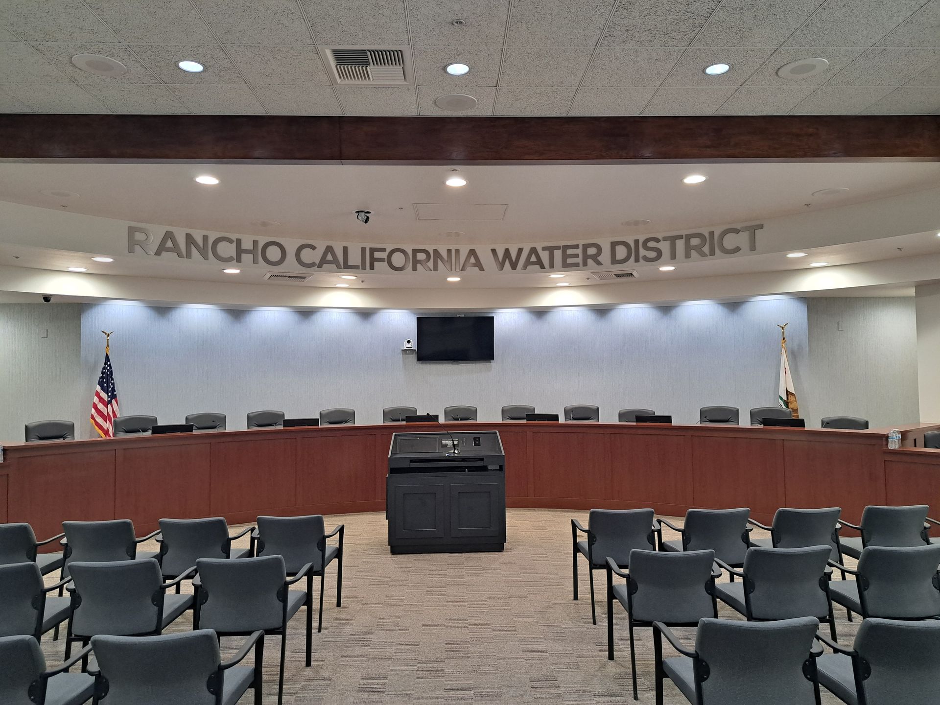 Rancho California Water District council chamber with podium, dais, and rows of seating