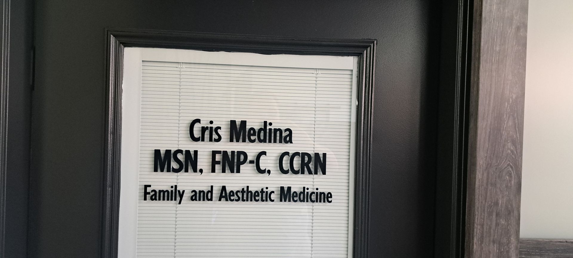 Door sign reading “Cris Medina, MSN, FNP-C, CCN” and “Family and Aesthetic Medicine.”