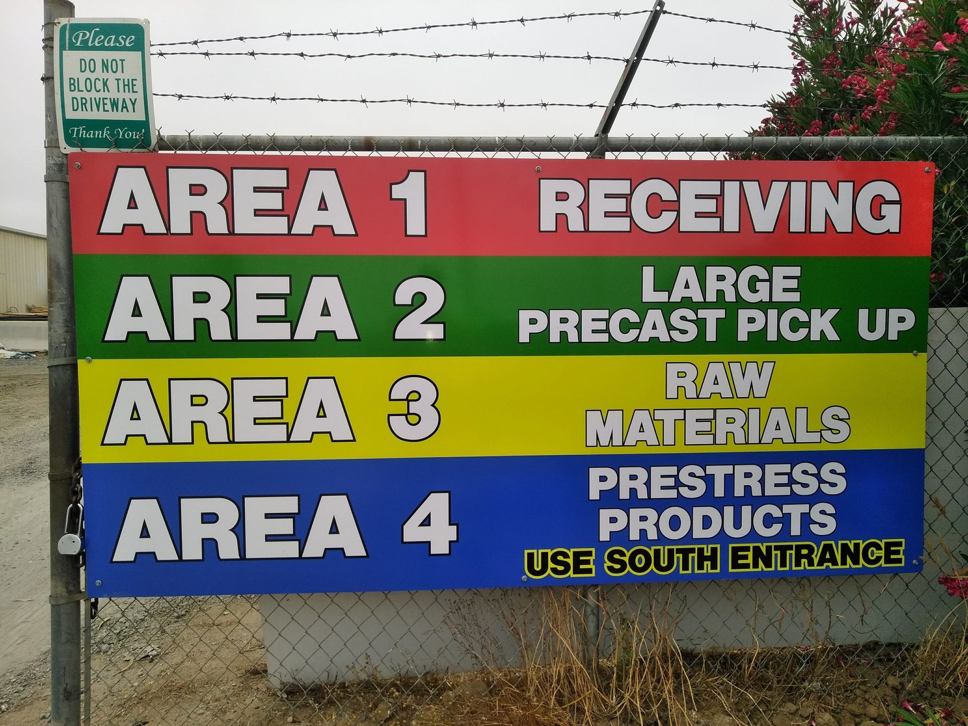 Color-coded sign listing Areas 1-4: Receiving, Large Precast Pickup, Raw Materials, Prestress Products, Use South Entrance