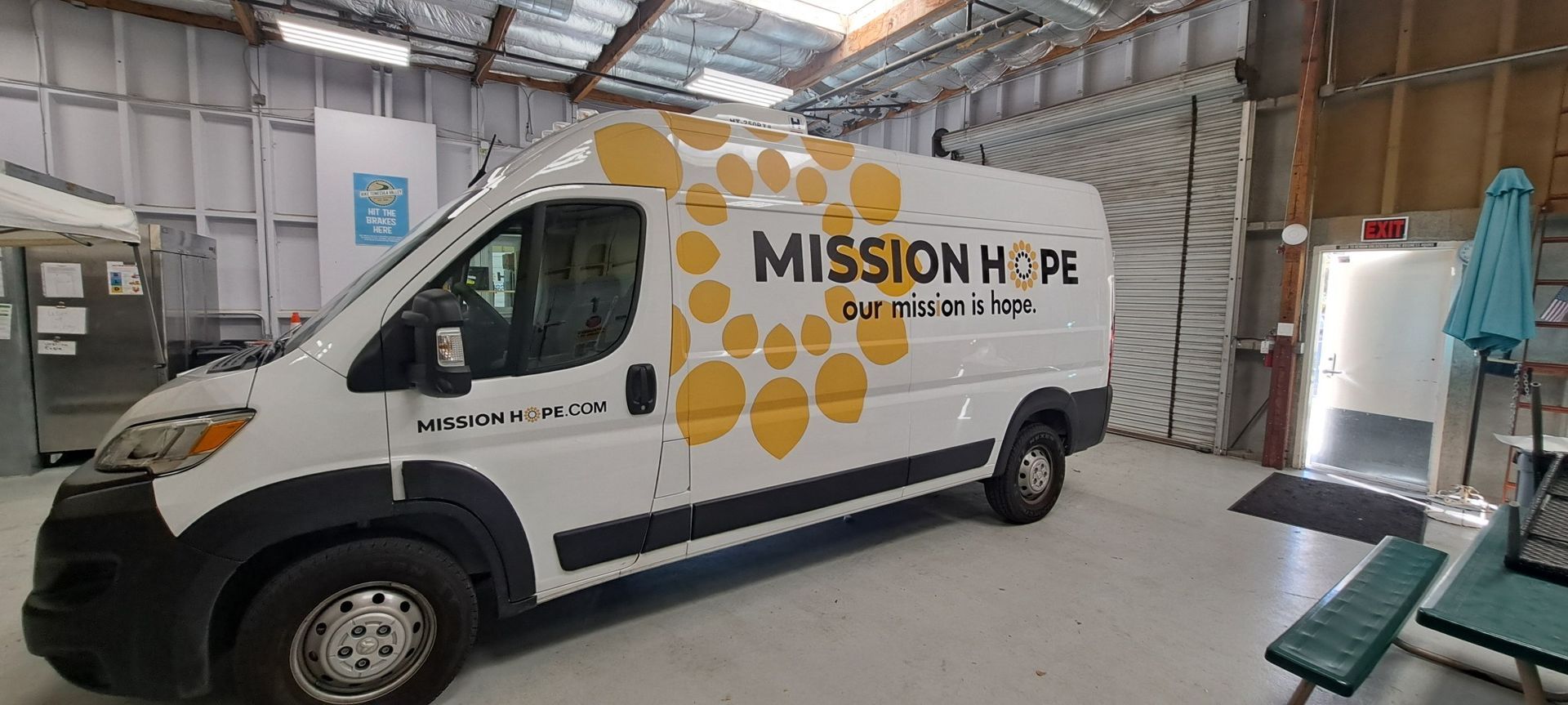White Mission Hope van parked inside a warehouse garage