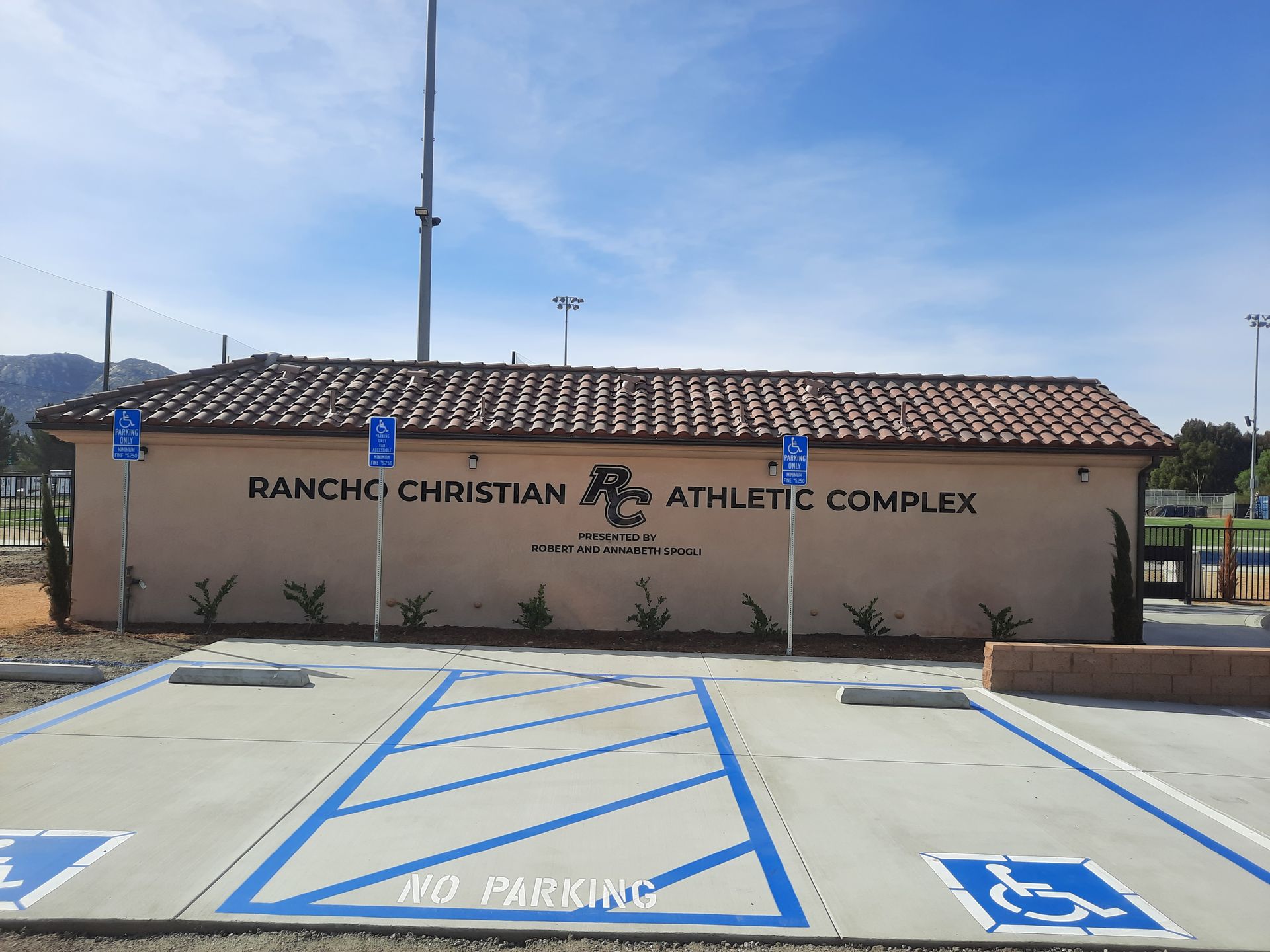 Ranch Christian Athletic Complex building with accessible parking spaces in front