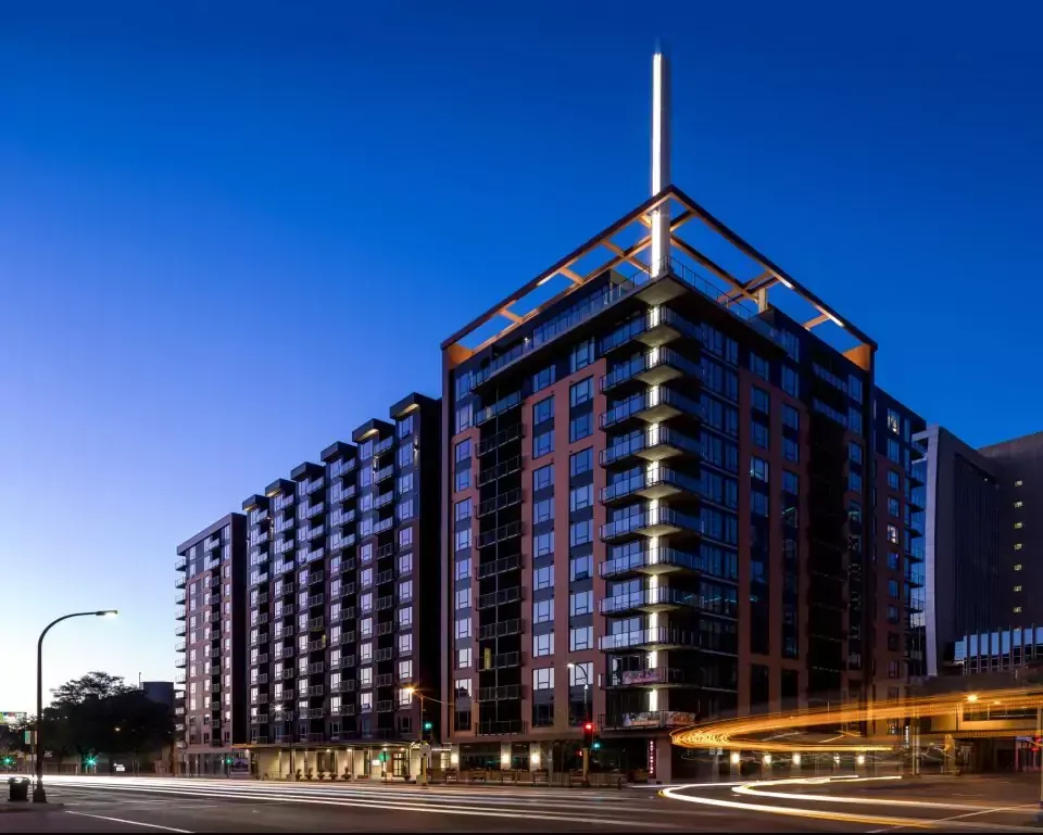 A tall building with a light on top of it