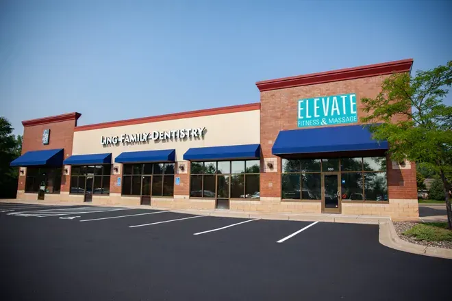 A building with a sign that says elevate on it