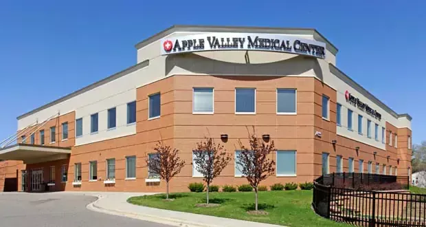 A large brick building with a sign that says oakle valley medical center