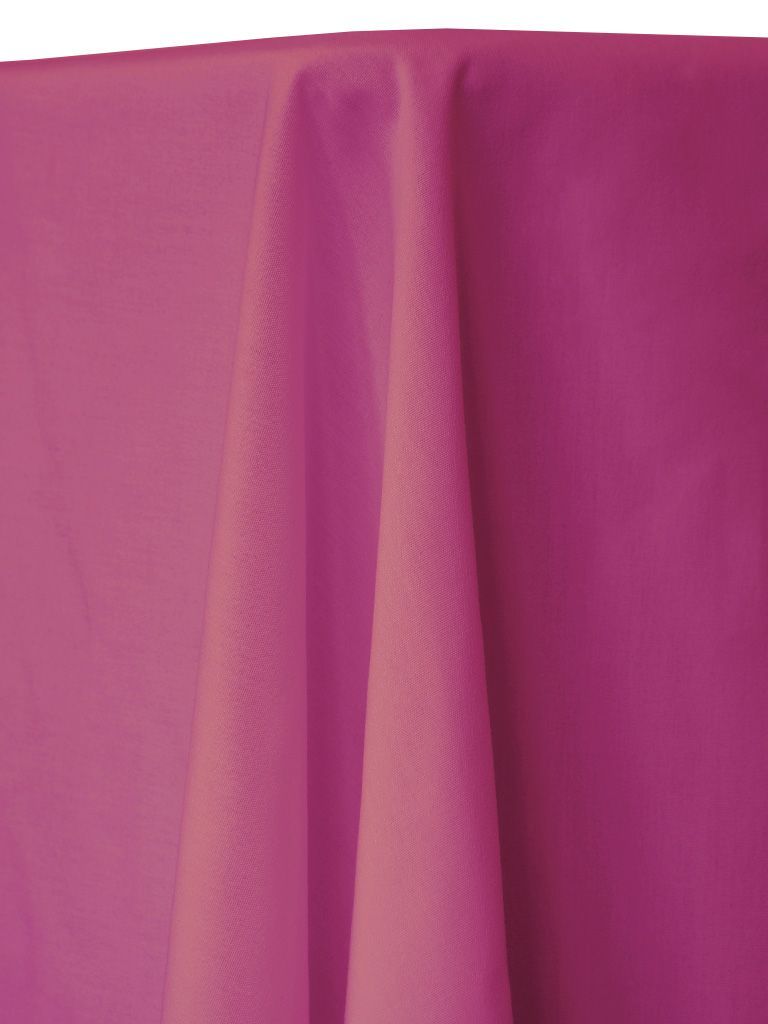 Magenta tablecloth with folds.