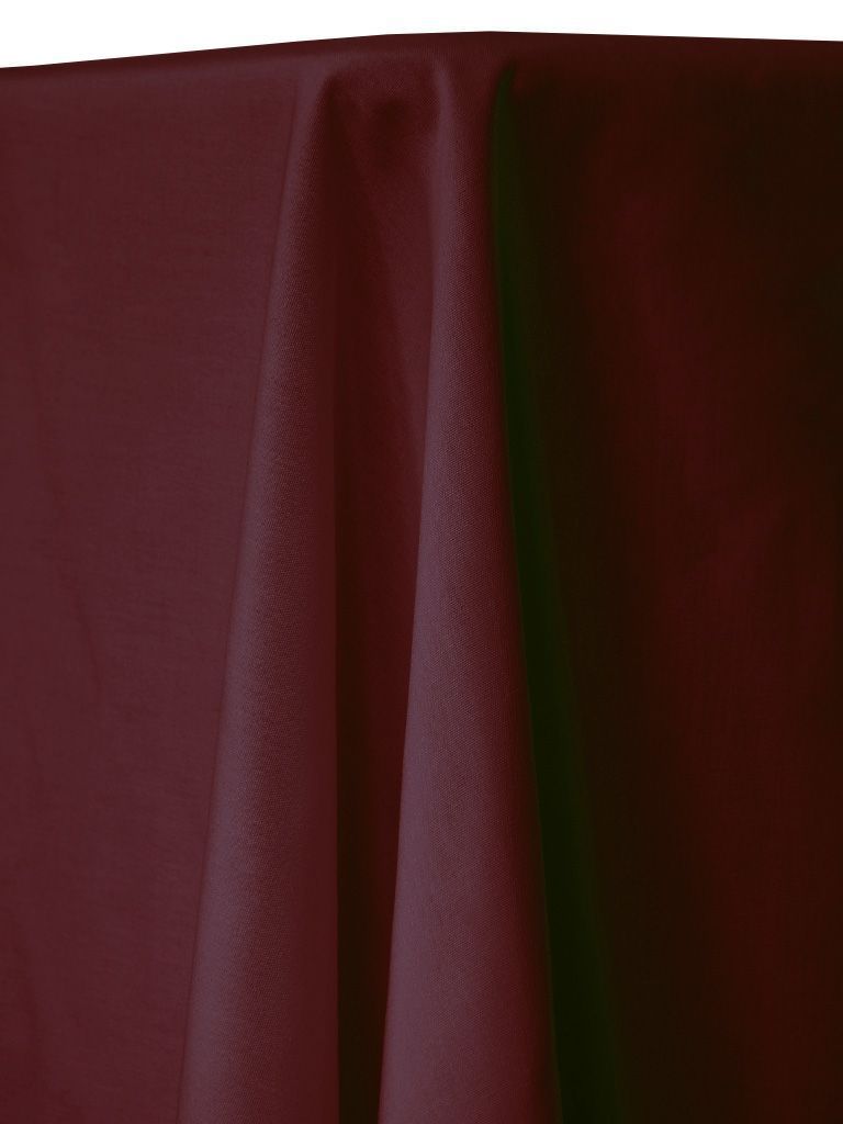Burgundy tablecloth draped over a table, with visible folds and subtle texture.