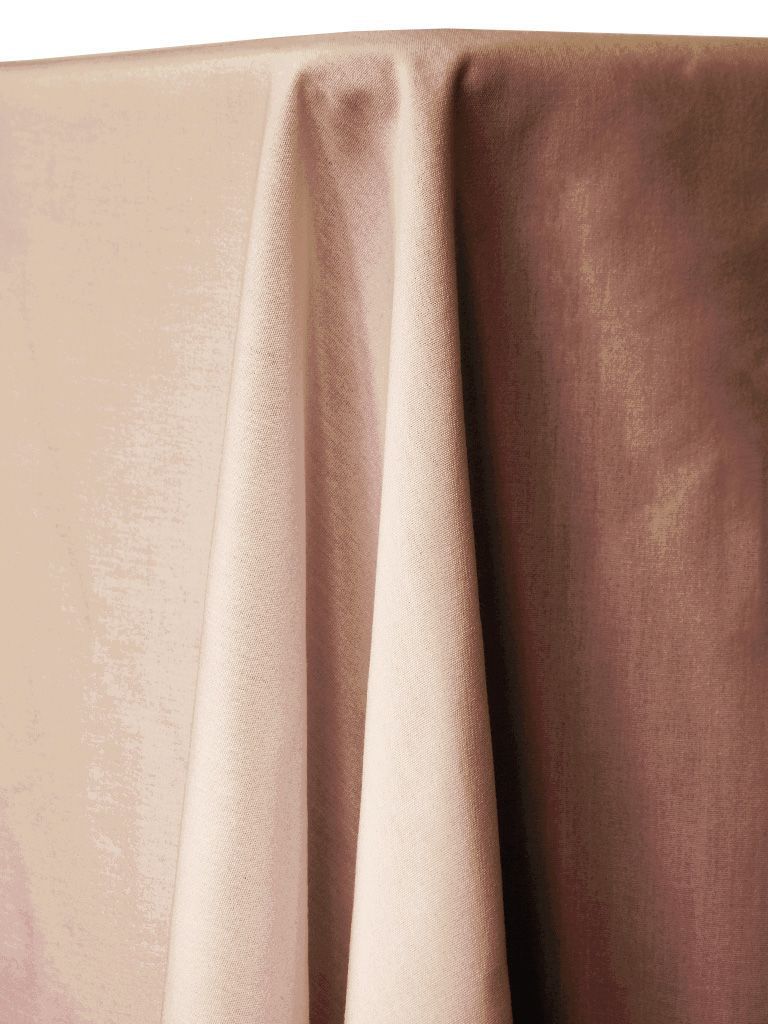 Beige draped fabric with visible texture, well lit with shadows.