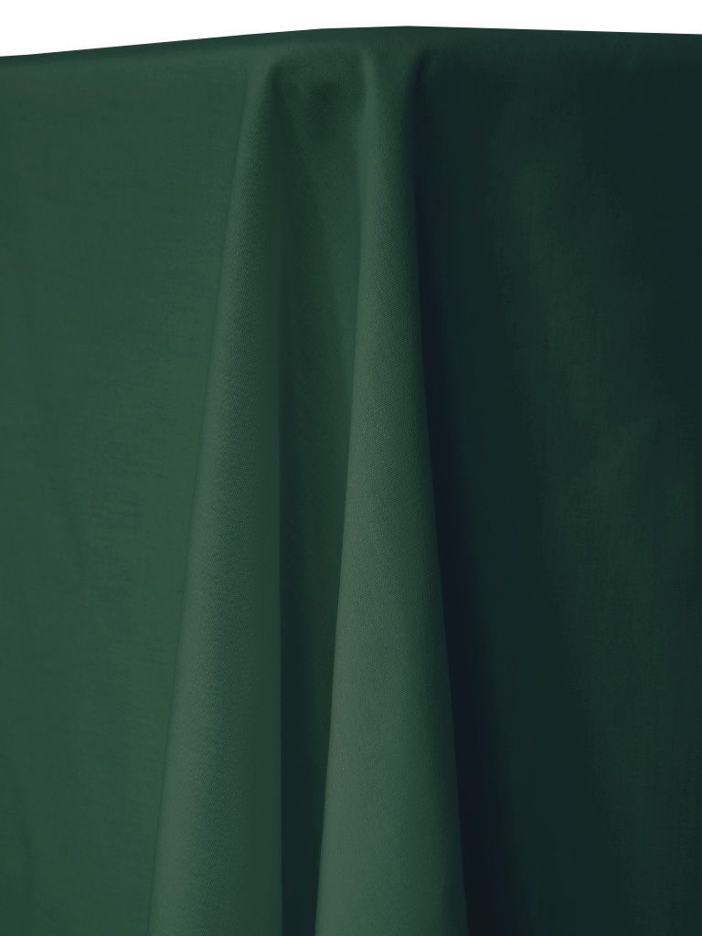 Dark green fabric draped over a table.