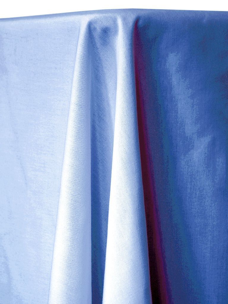 Light blue tablecloth draped over a table, with visible folds and a shiny texture.