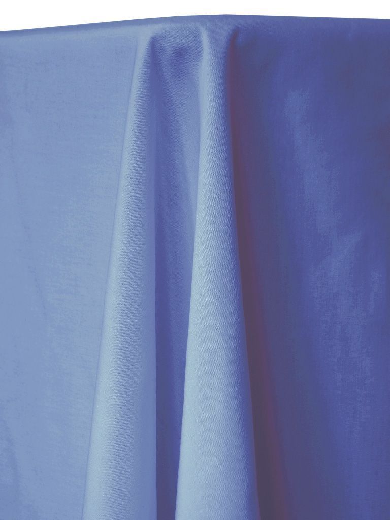 Blue tablecloth draped over a table, showing folds and shadows.