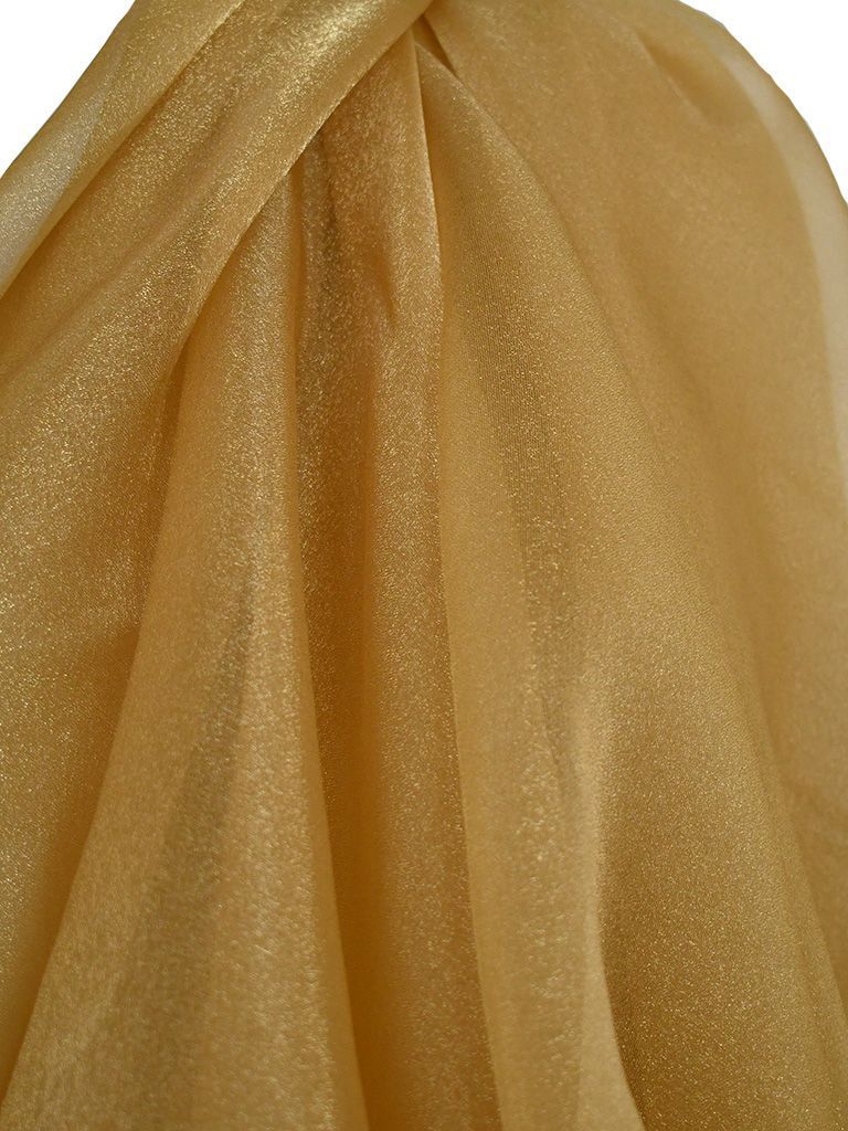 Gold, shimmering fabric draped in soft folds.