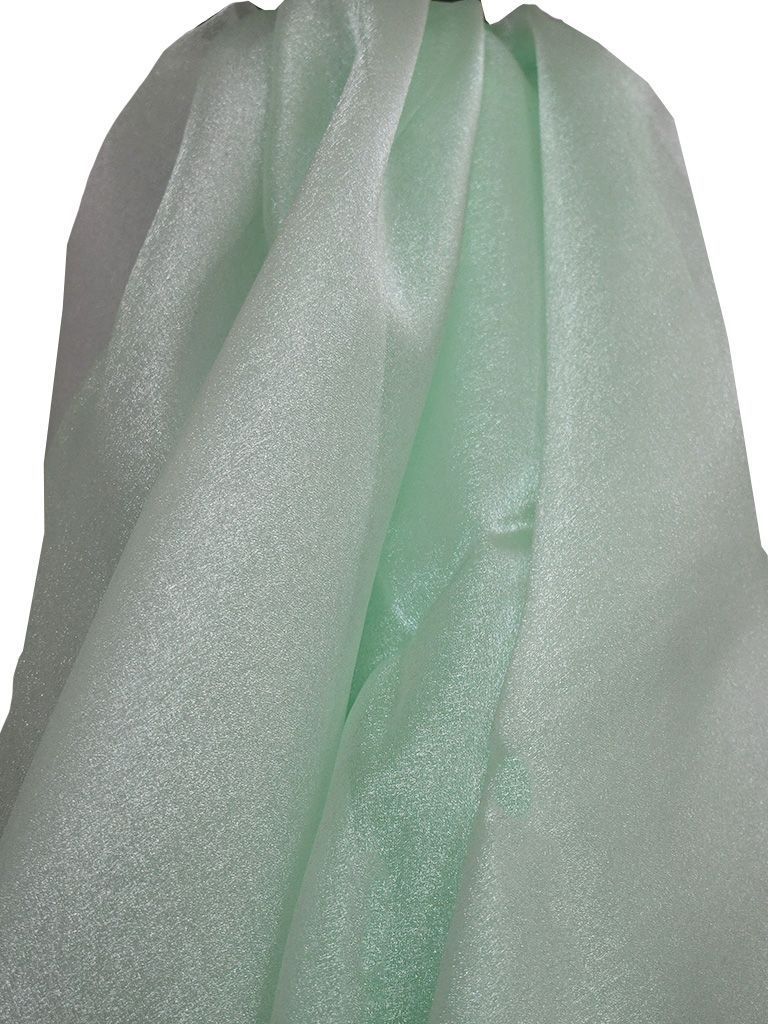 Light green, sparkly, draped fabric.