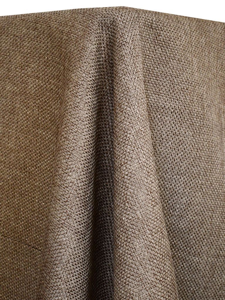 Brown, textured fabric draped over a surface, showing woven detail.
