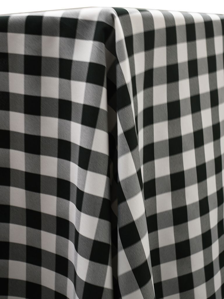 Black and white checkered tablecloth draped over a table.