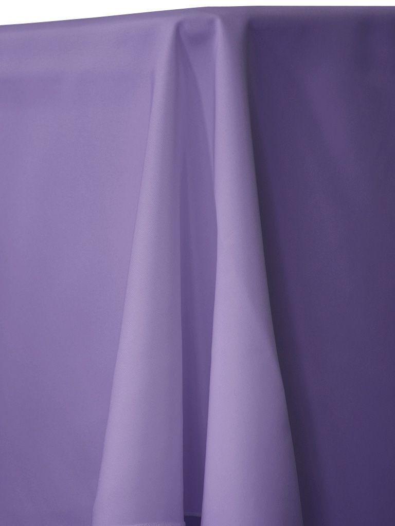 Purple fabric draped over a surface, with soft folds and shadows.